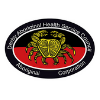 Circular medical logo with a yellow symbol at the center, red inner circle, and black outer ring with text around the edge
